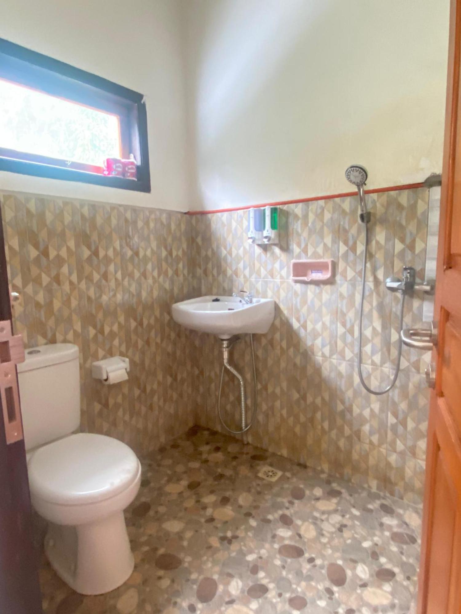 Sri Sedana Guest House Сидемен Экстерьер фото